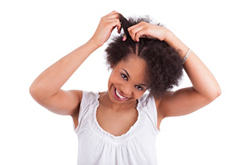 Il "regime minimo" dell'afro hair care